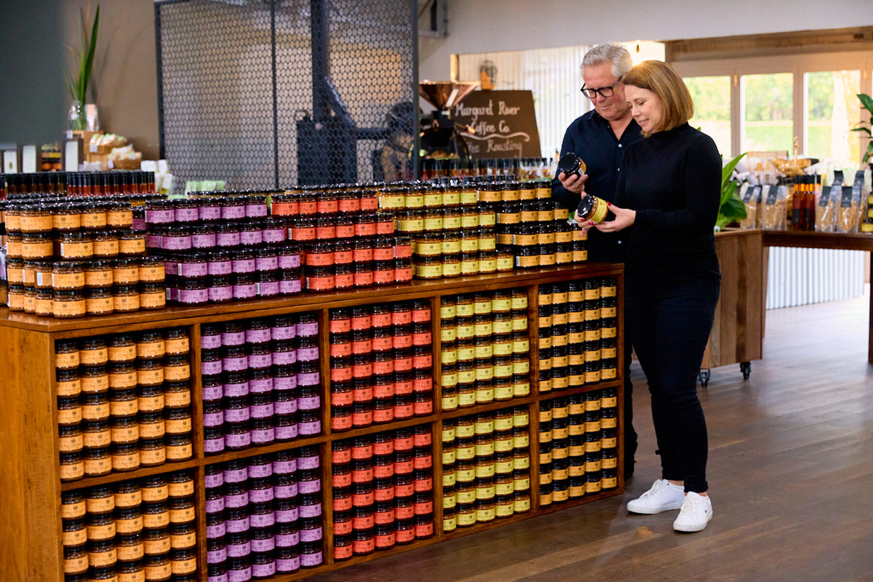Shelves of colourful handmade preserves inside Providore
